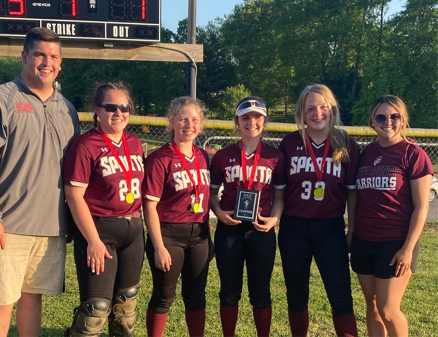 White County coaches were allowed to choose four players for the all-tournament team. Those four players were Mabry Taylor (8th grade pitcher), Kylie Norvell (8th grade shortstop/pitcher), Callie Phillips (8th grade catcher), and Addison Howell (8th grade third baseman/pitcher). Also pictured is Coach Austin Allen.